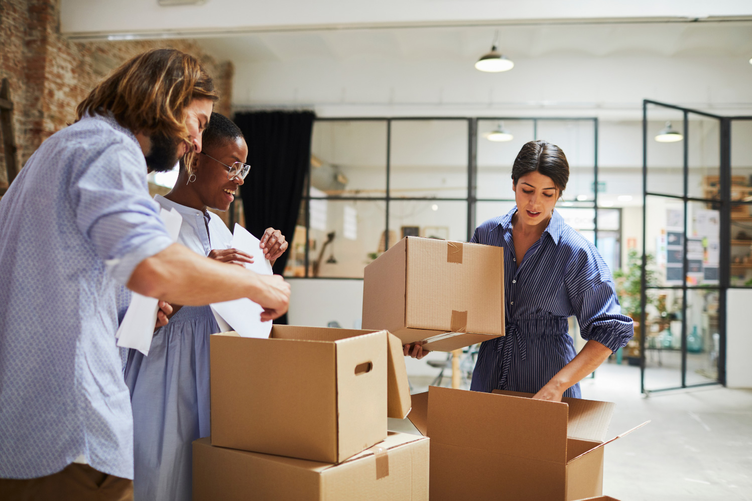 staff using the Office Relocation Checklist to pack up the office